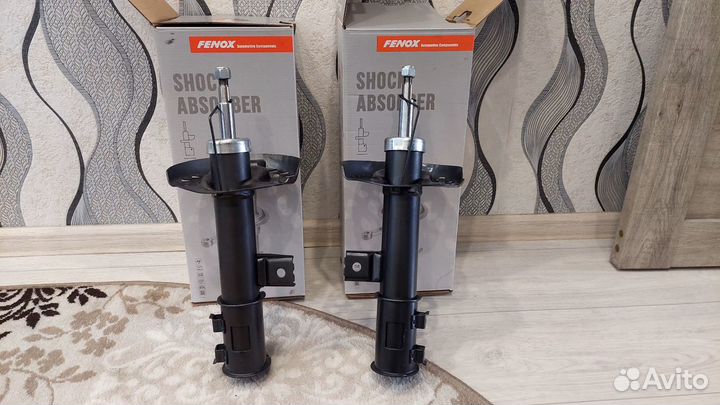 Передние стойки амортизатора