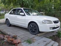Mazda Familia 1.5 AT, 1999, 385 000 км, с пробегом, цена 260 000 руб.