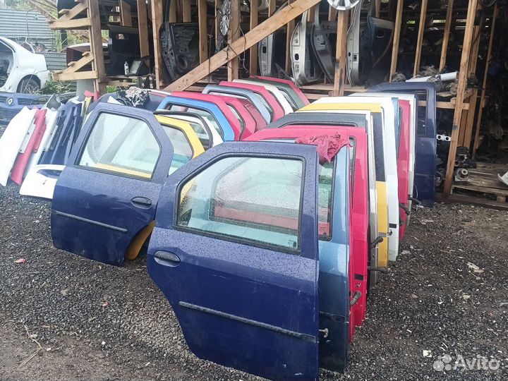 Задние левые двери renault logan 1