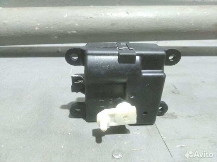 Моторчик заслонки отопителя Nissan Almera Classic