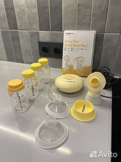 Молокоотсос medela swing электрический