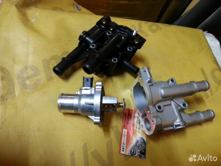 Корпус термостата новый Chevrolet Opel