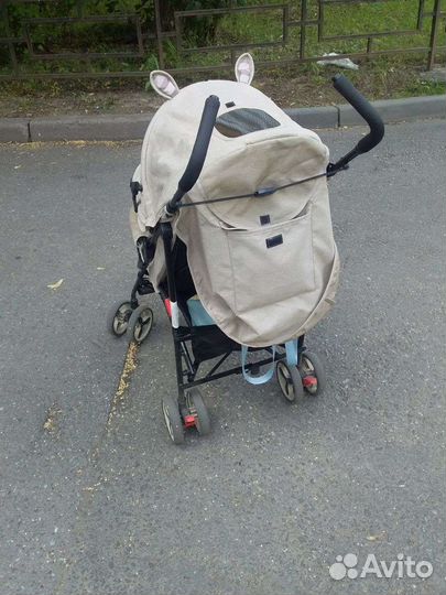 Прогулочная коляска трость