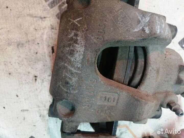 Суппорт тормозной передний левый LADA Xray