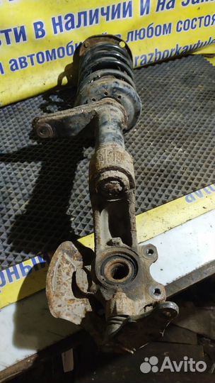 Стойка амортизатора переднего левого Chevrolet Lan