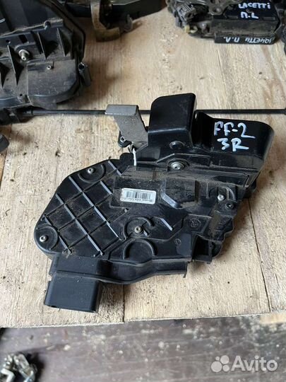 Замок задний правый Ford Focus 2