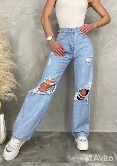 Джинсы клешь рваные