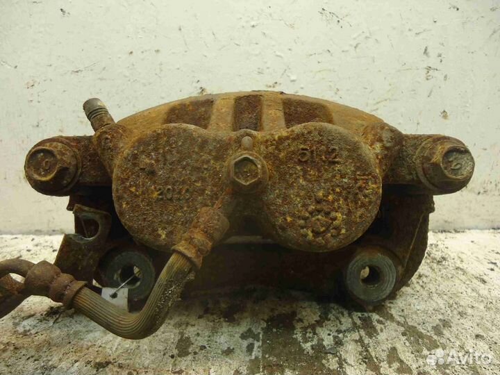 Суппорт передний правый Nissan Armada 1 TA60