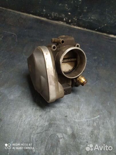 Дросельная заслонка 