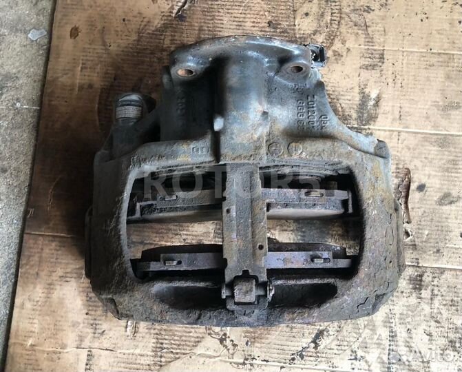 Суппорт тормозной задний левый DAF 95 2 (XF) 2006
