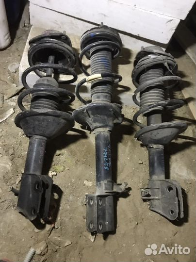 Стойка амортизатора G10 20310FA230 левая передняя