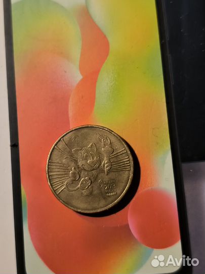 Монета кот с факелом Казань 2013