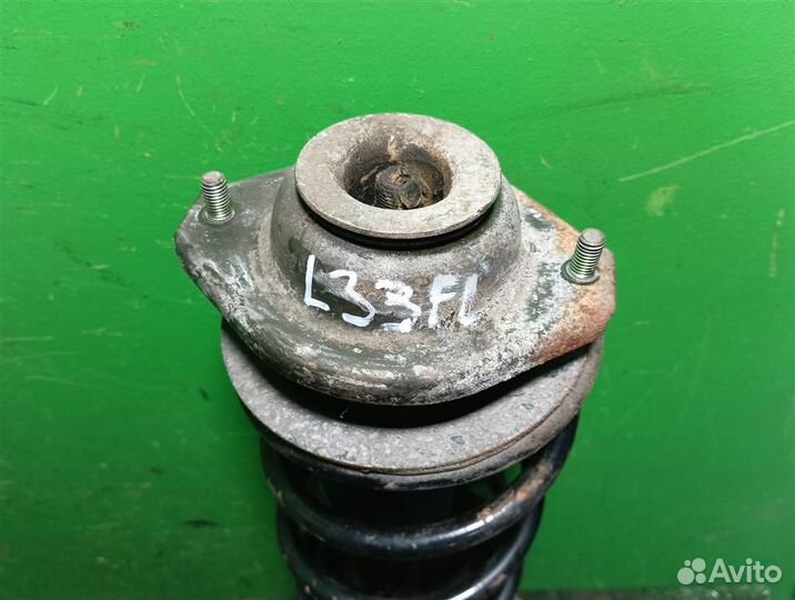 Стойка амортизатора передняя левая Suzuki Ignis 2