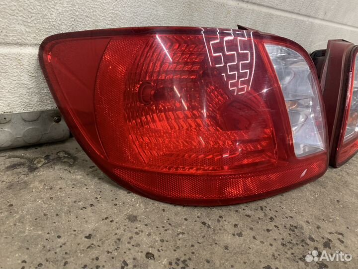 Kia Rio 2 - Фонарь задний левыц седан