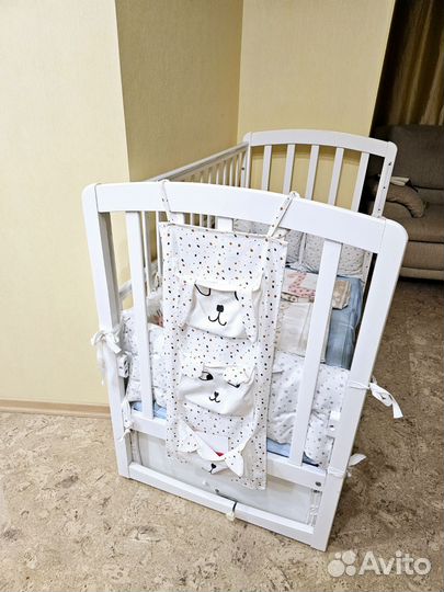 Кроватка с маятник и ящиками