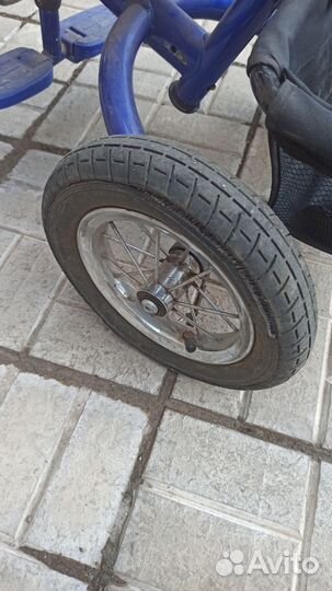 Трехколесный велосипед с ручкой