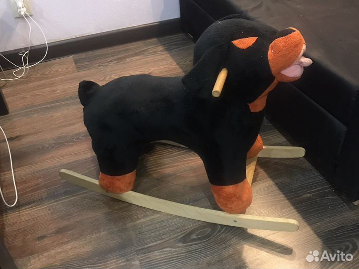 Собака качалка