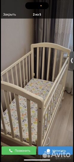 Детская кроватка с маятником и ящиком