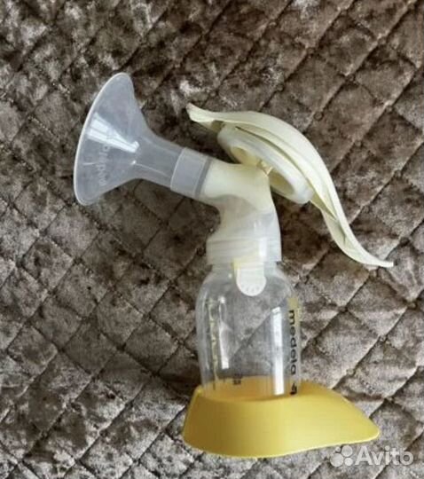 Молокоотсос ручной medela