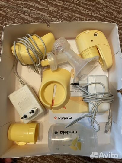 Молокоотсос medela mini electric