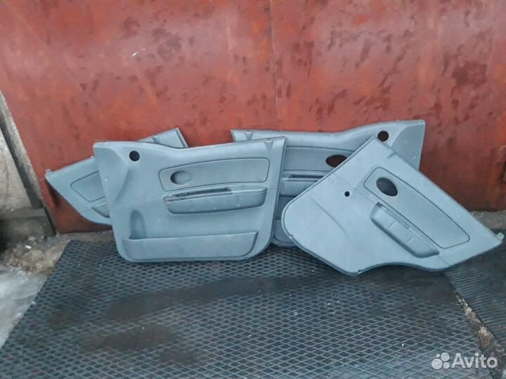 Обшивка двери Шевроле Спарк м200