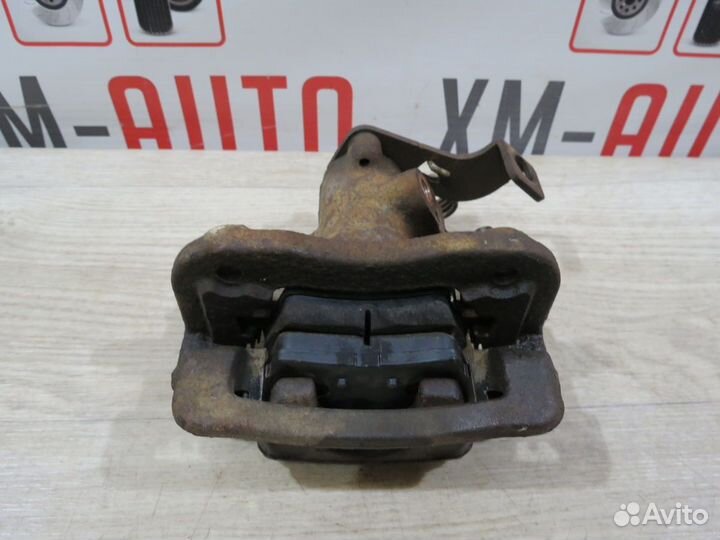 Суппорт тормозной задний левый Hyundai Solaris