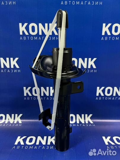 Передний правый амортизатор на Форд Фокус 2