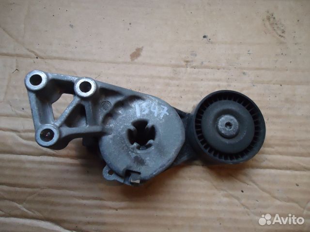 Ролик-натяжитель ручейкового ремня Volkswagen