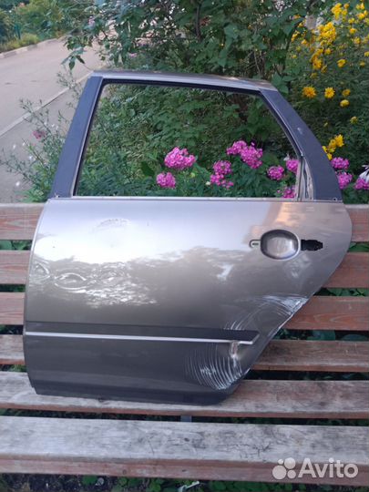 Дверь задняя левая от гранты фл 2021 года выпуска