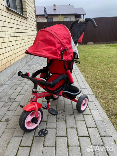 Трехколесный велосипед с ручкой