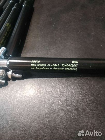 Газовый упор дверей,капота трактора агромаш 50ТК