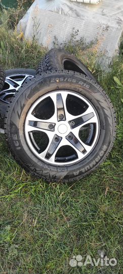 Нива. Зимняя шипованная резина на литых дисках