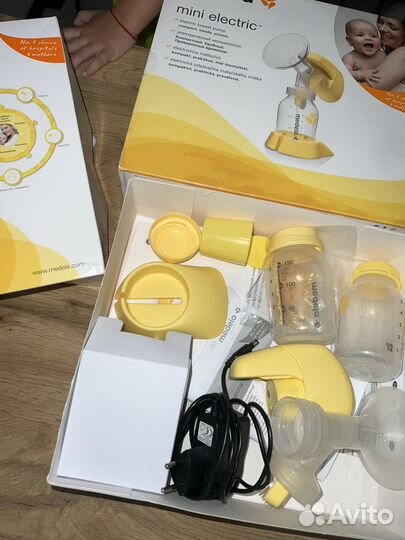 Молокоотсос medela электрический