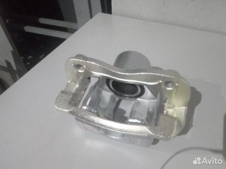 Суппорт передний левый Hyundai Solaris Kia Rio