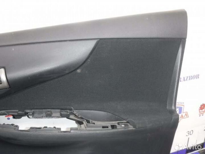 Обшивка двери передняя правая Toyota Corolla 151