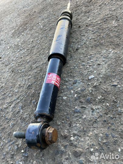 Альмера g15 задний амортизатор