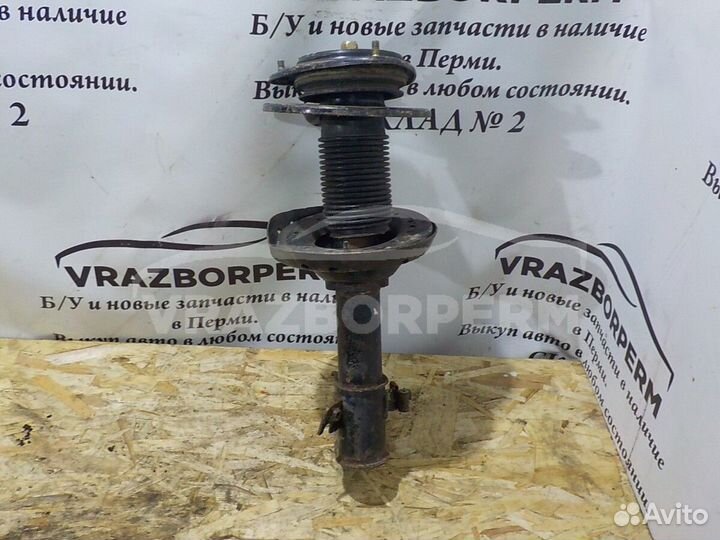 Амортизатор передний левый Subaru Legacy