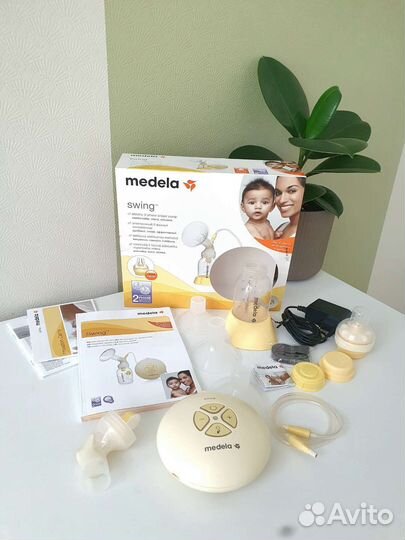 Молокоотсос medela swing электрический