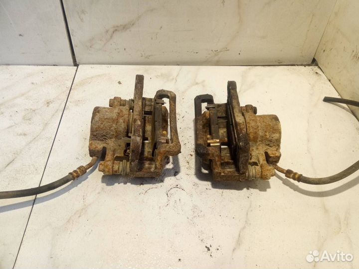 Суппорт тормозной задний Opel Antara рест. L07