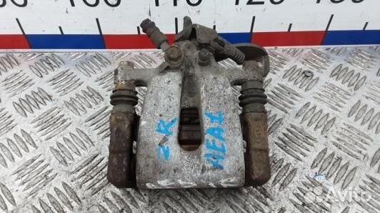 Суппорт тормозной задний правый KIA CEE'D 2 (JD)