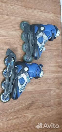 Роликовые коньки