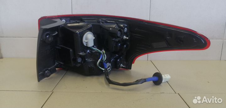 Фонарь задний наружный левый Outlander (GF) 2012