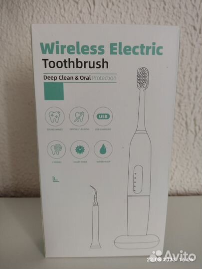 Электрическая зубная щётка