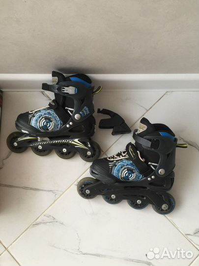 Роликовые коньки