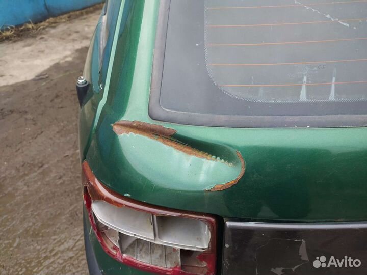 Крышка багажника Хлопушка Опель Астра F