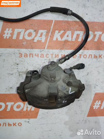 Суппорт тормозной передний левый Skoda Fabia