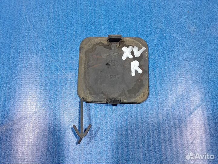 Заглушка буксировочного крюка Субару XV 2014г