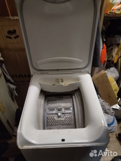 Стиральная машина с вертикальной загрузкой