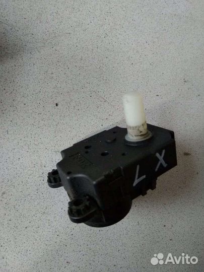 Моторчик заслонки отопителя Mitsubishi Lancer X 10