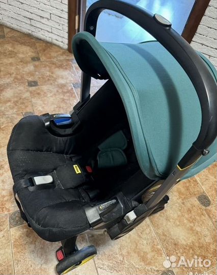 Коляска Автокресло doona с базой isofix